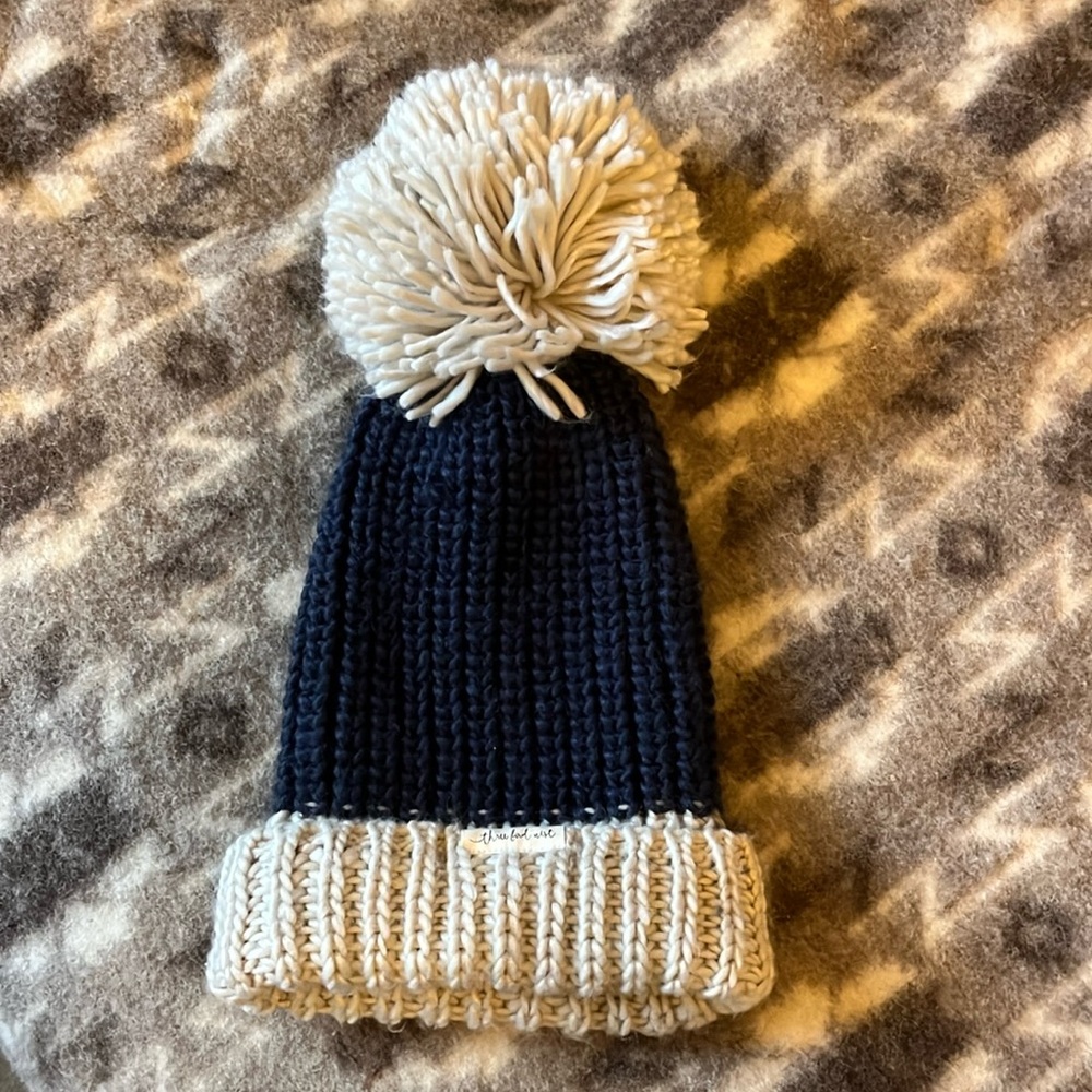 SOLD Three Bird Nest Giant Pom beanie, navy and oatmeal